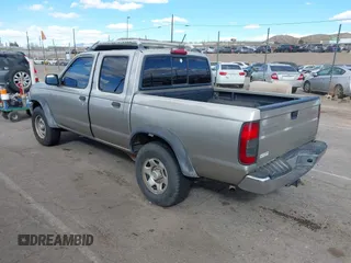 2000 Nissan Frontier XE with VIN 1N6ED27T7YC402398, listed as a IAAI auction lot 41794057 with 175,499 mi miles and . Bid and sale history available at DreamBid. Image 3.