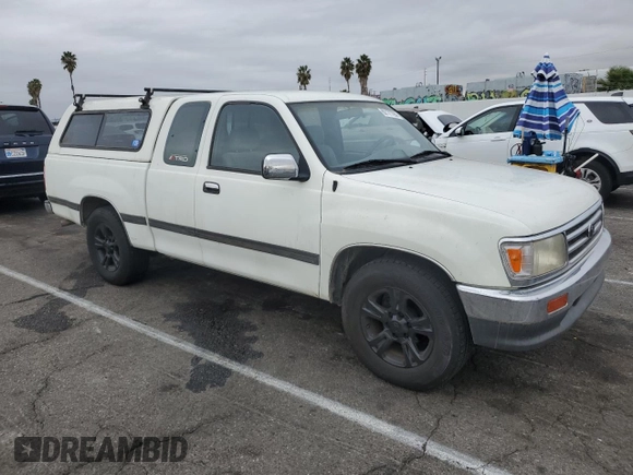1995 Toyota T100 SR5 with VIN JT4VD12F8S0007489, listed as a Copart auction lot 82177794 with 290,145 mi miles and Clean Title. Bid and sale history available at DreamBid. Image 4.