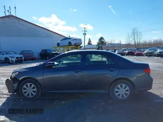 2009 Toyota Corolla with VIN JTDBL40E499070662, listed as a IAAI auction lot 41590923 with 148,295 mi miles. Bid and sale history available at carsss.com. Image 14.