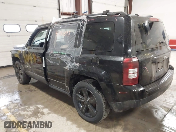 2014 Jeep Patriot Latitude with VIN 1C4NJPFB4ED645447, listed as a IAAI auction lot 41851597 with 128,319 mi miles and . Bid and sale history available at carsss.com. Image 3.