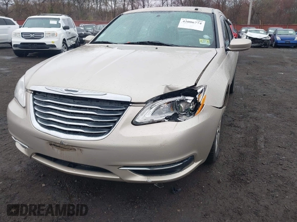 2014 Chrysler 200 LX with VIN 1C3CCBAB2EN213983, listed as a IAAI auction lot 42006774 with 80,615 mi miles and . Bid and sale history available at carsss.com. Image 17.
