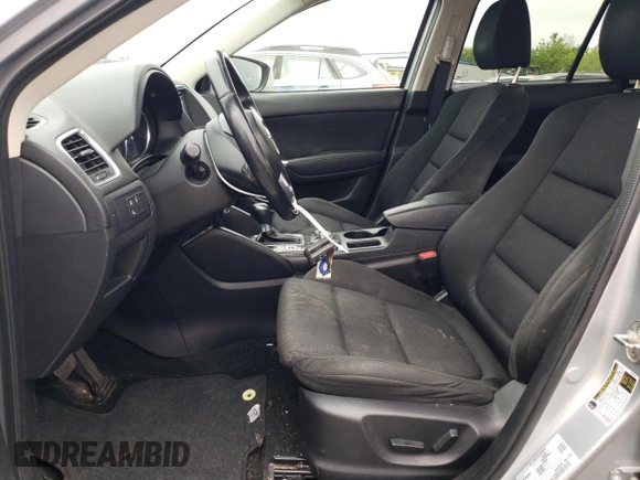 2016 Mazda CX-5 Touring with VIN JM3KE4CY6G0655381, listed as a Copart auction lot 53311445 with 145,513 mi miles and Salvage Title. Bid and sale history available at carsss.com. Image 7.