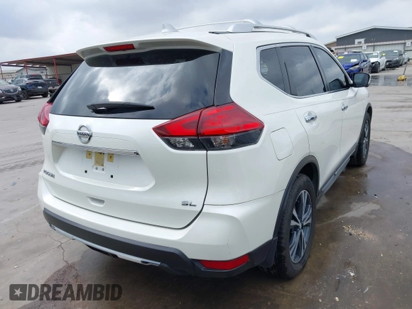 2017 Nissan Rogue SV with VIN JN8AT2MT2HW380211, listed as a IAAI auction lot 41672425 with 39,700 mi miles and . Bid and sale history available at DreamBid. Image 4.