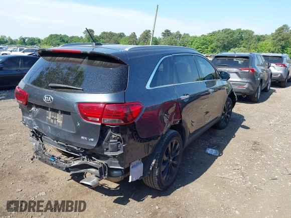 2020 Kia Sorento EX z VIN 5XYPHDA51LG706563, wystawiony jako IAAI lot #39526327 z przebiegiem 36 833 mil mil oraz . Historia ofert i sprzedaży dostępna na DreamBid. Obrazek 4.
