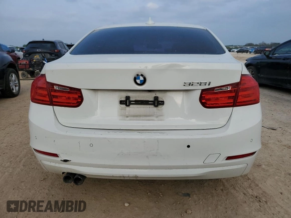 2014 BMW 3 Series 328i with VIN WBA3C1C52EK111563, listed as a Copart auction lot 51465165 with 142,125 mi miles and Salvage title. Bid and sale history available at DreamBid. Image 6.