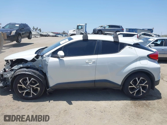 2018 Toyota C-HR XLE with VIN NMTKHMBX8JR036857, listed as a IAAI auction lot 42667018 with 63,058 mi miles and . Bid and sale history available at DreamBid. Image 15.