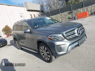 2018 Mercedes-Benz GLS with VIN 4JGDF6EE7JB098694, listed as a IAAI auction lot 41294697 with 104,807 mi miles. Bid and sale history available at carsss.com. Image 1.