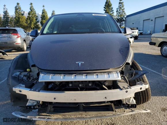 2022 Tesla Model Y Long Range with VIN 7SAYGDEE5NA022384, listed as a Copart auction lot 49283345 with 31,925 mi miles and Salvage Title. Bid and sale history available at carsss.com. Image 5.