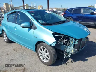 2012 Toyota Prius One z VIN JTDKDTB35C1029241, wystawiony jako IAAI lot #42179562 z przebiegiem 84 506 mil mil oraz . Historia ofert i sprzedaży dostępna na DreamBid. Obrazek 1.