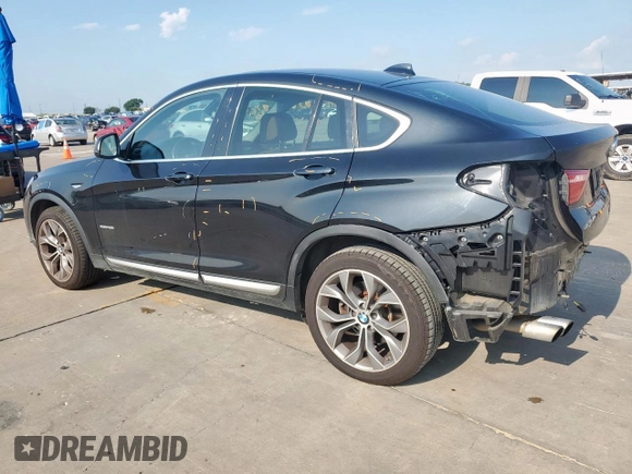 2015 BMW X4 xDrive28i with VIN 5UXXW3C52F0M87621, listed as a Copart auction lot 59176505 with 163,727 mi miles and Salvage title. Bid and sale history available at DreamBid. Image 2.
