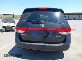 2014 Honda Odyssey Touring with VIN 5FNRL5H99EB133864, listed as a IAAI auction lot 42201359 with 122,490 mi miles and . Bid and sale history available at DreamBid. Image 16.