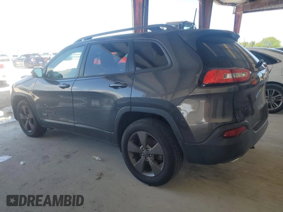 2017 Jeep Cherokee Latitude with VIN 1C4PJMCS5HW545748, listed as a Copart auction lot 51156965 with 106,857 mi miles and Salvage Title. Bid and sale history available at carsss.com. Image 2.