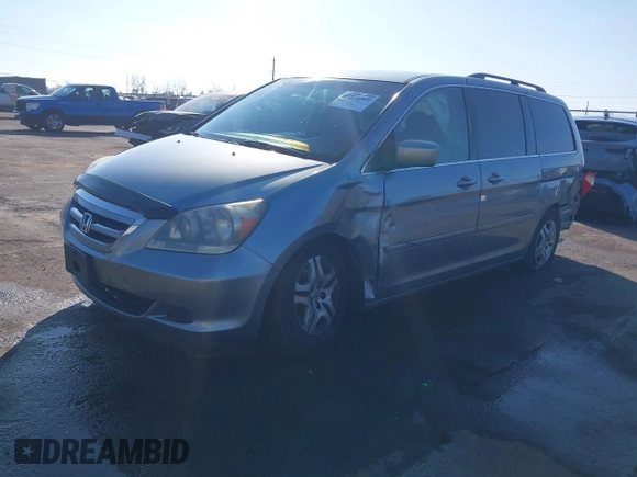 2006 Honda Odyssey EX with VIN 5FNRL38436B001144, listed as a IAAI auction lot 41372589 with 255,666 mi miles. Bid and sale history available at carsss.com. Image 2.