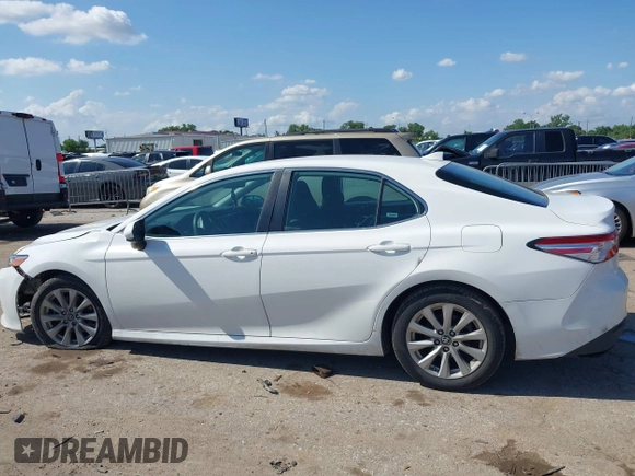 2019 Toyota Camry LE with VIN 4T1B11HK4KU180995, listed as a IAAI auction lot 42088737 with 133,813 mi miles and . Bid and sale history available at DreamBid. Image 15.