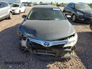 2012 Toyota Camry XLE z VIN 4T1BD1FK8CU048172, wystawiony jako Copart lot #51941205 z przebiegiem 186 001 mil mil oraz Szkoda całkowita • Salvage title. Historia ofert i sprzedaży dostępna na DreamBid. Obrazek 5.