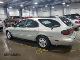 2003 Ford Taurus SE Standard with VIN 1FAFP58U43A136534, listed as a Copart auction lot 53632405 with 194,902 mi miles and Salvage Title. Bid and sale history available at carsss.com. Image 2.