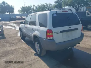 2002 Ford Escape XLT Choice with VIN 1FMYU03132KD02414, listed as a IAAI auction lot 42121509 with 218,148 mi miles and . Bid and sale history available at DreamBid. Image 3.