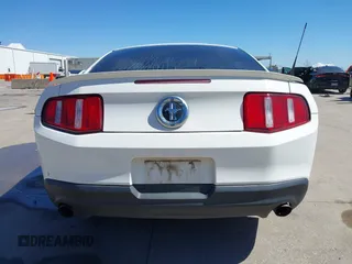 2012 Ford Mustang Premium with VIN 1ZVBP8AM2C5255855, listed as a IAAI auction lot 41812764 with 242,676 mi miles and . Bid and sale history available at DreamBid. Image 16.
