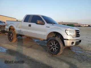2009 Ford F-150 STX with VIN 1FTRX12879KB52256, listed as a Copart auction lot 44255075 with 211,613 mi miles and Salvage Title. Bid and sale history available at carsss.com. Image 4.