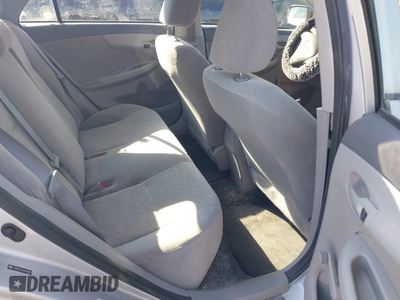 2010 Toyota Corolla with VIN JTDBU4EE3A9098933, listed as a IAAI auction lot 41643811 with 69,806 mi miles. Bid and sale history available at carsss.com. Image 8.