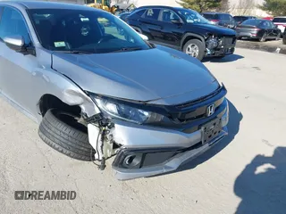 2019 Honda Civic Sport with VIN 2HGFC2F8XKH602463, listed as a IAAI auction lot 41966052 with 95,416 mi miles and . Bid and sale history available at DreamBid. Image 6.