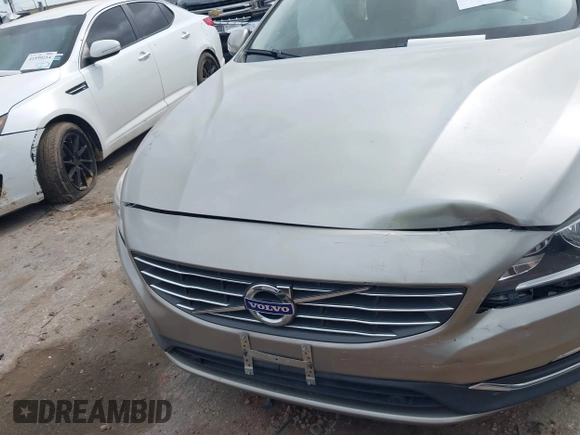 2016 Volvo S60 T5 Drive-E Premier with VIN YV126MFK0G2414153, listed as a IAAI auction lot 41931477 with 75,792 mi miles. Bid and sale history available at carsss.com. Image 12.