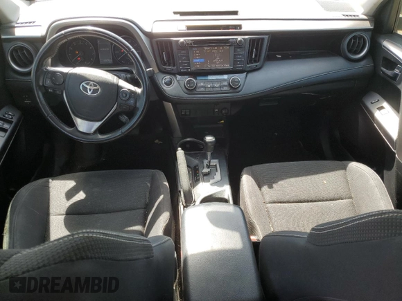 2018 Toyota RAV4 XLE with VIN JTMWFREV3JJ729302, listed as a Copart auction lot 49823765 with 100,576 mi miles and Salvage Title. Bid and sale history available at DreamBid. Image 8.