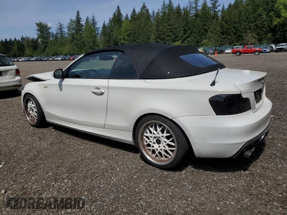 2010 BMW 1 Series 128i with VIN WBAUN1C50AVH81851, listed as a Copart auction lot 56607275 with 145,036 mi miles and Salvage title. Bid and sale history available at DreamBid. Image 2.