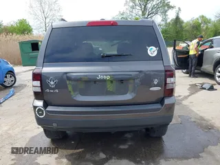 2014 Jeep Patriot Latitude with VIN 1C4NJRFB3ED847997, listed as a IAAI auction lot 42109140 with 121,299 mi miles and . Bid and sale history available at carsss.com. Image 16.