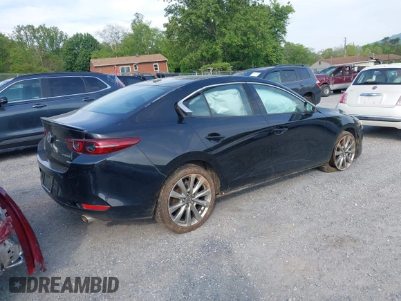 2021 Mazda 3 Premium z VIN 3MZBPADL2MM254467, wystawiony jako IAAI lot #42151557 z przebiegiem 63 282 mil mil oraz . Historia ofert i sprzedaży dostępna na DreamBid. Obrazek 4.