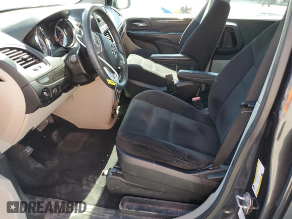 2014 Dodge Grand Caravan American Value with VIN 2C4RDGBG2ER361449, listed as a Copart auction lot 54940615 with 85,012 mi miles and Salvage Title. Bid and sale history available at DreamBid. Image 7.