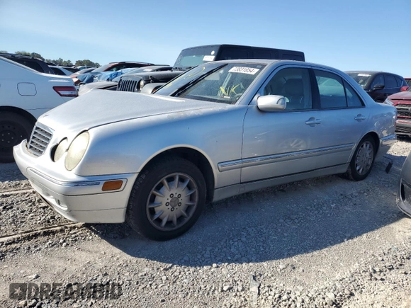 2001 Mercedes-Benz E-Class with VIN WDBJF65J11B294200, listed as a Copart auction lot 73831854 with 117,441 mi miles and Salvage Title. Bid and sale history available at carsss.com. Image 1.