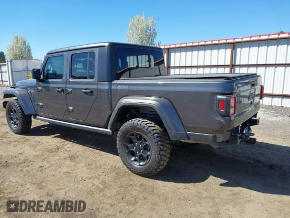 2023 Jeep Gladiator Sport S z VIN 1C6HJTAG2PL575276, wystawiony jako IAAI lot #42056473 z przebiegiem 17 043 mil mil oraz . Historia ofert i sprzedaży dostępna na DreamBid. Obrazek 3.