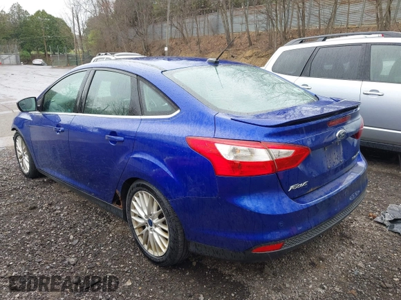 2014 Ford Focus Titanium with VIN 1FADP3J28EL240911, listed as a IAAI auction lot 42082812 with 144,625 mi miles. Bid and sale history available at carsss.com. Image 3.