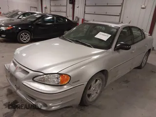 2003 Pontiac Grand Am GT with VIN 1G2NW52E93M605453, listed as a IAAI auction lot 41546839 with 202,918 mi miles. Bid and sale history available at carsss.com. Image 17.