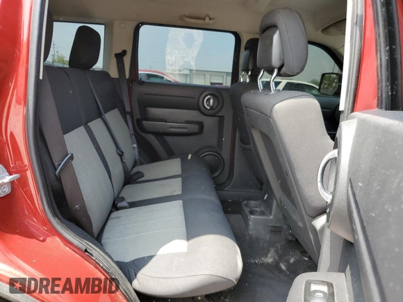 2010 Dodge Nitro Heat z VIN 1D4PT4GK4AW156936, wystawiony jako Copart lot #59654555 z przebiegiem 194 045 mil mil oraz Szkoda całkowita • Salvage title. Historia ofert i sprzedaży dostępna na DreamBid. Obrazek 11.