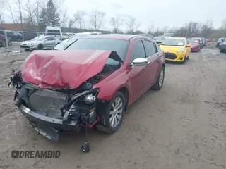 2014 Chrysler 200 Limited with VIN 1C3CCBCGXEN152052, listed as a IAAI auction lot 42017354 with 138,637 mi miles and . Bid and sale history available at carsss.com. Image 2.