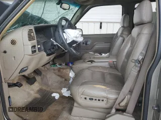 1999 GMC Yukon with VIN 1GKEC13R4XJ735246, listed as a Copart auction lot 56429874 with 258,616 mi miles and Salvage Title. Bid and sale history available at carsss.com. Image 7.