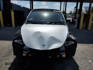 2024 Tesla Model Y Long Range with VIN 7SAYGDEEXRA288960, listed as a Copart auction lot 60801525 with 18,942 mi miles and Salvage title. Bid and sale history available at DreamBid. Image 5.