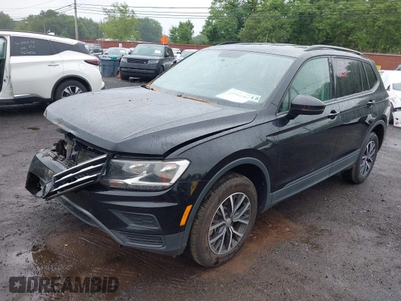 2021 Volkswagen Tiguan S z VIN 3VV0B7AX3MM031908, wystawiony jako IAAI lot #42504384 z przebiegiem 42 510 mil mil oraz . Historia ofert i sprzedaży dostępna na DreamBid. Obrazek 19.