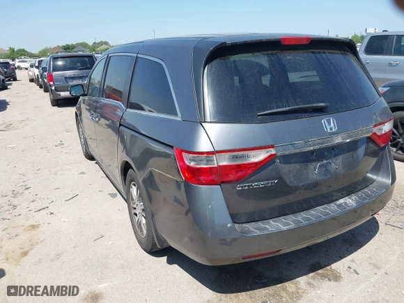 2012 Honda Odyssey EX with VIN 5FNRL5H49CB139262, listed as a IAAI auction lot 42024256 with 124,695 mi miles. Bid and sale history available at carsss.com. Image 3.
