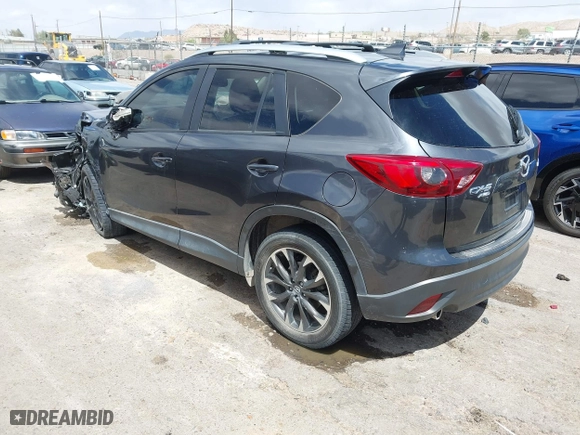2016 Mazda CX-5 Grand Touring with VIN JM3KE4DY7G0643643, listed as a IAAI auction lot 42077497 with 120,343 mi miles. Bid and sale history available at carsss.com. Image 3.
