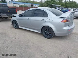 2015 Mitsubishi Lancer ES with VIN JA32U2FU4FU008377, listed as a IAAI auction lot 42124216 with 204,447 mi miles. Bid and sale history available at carsss.com. Image 3.