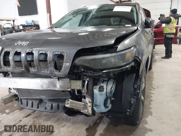 2019 Jeep Cherokee Limited with VIN 1C4PJMDX7KD282692, listed as a IAAI auction lot 41660914 with 64,955 mi miles and . Bid and sale history available at carsss.com. Image 6.