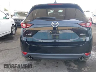 2020 Mazda CX-5 Touring with VIN JM3KFACM0L0804998, listed as a IAAI auction lot 41850998 with 44,519 mi miles. Bid and sale history available at carsss.com. Image 16.