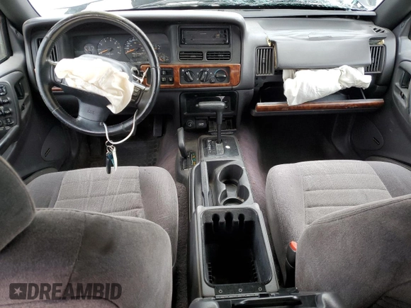1996 Jeep Grand Cherokee Laredo with VIN 1J4GZ58S2TC174270, listed as a Copart auction lot 49924815 with 0 mi miles and Salvage Title. Bid and sale history available at carsss.com. Image 8.