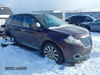 2011 Lincoln MKX with VIN 2LMDJ8JKXBBJ00587, listed as a IAAI auction lot 41576489 with 169,456 mi miles. Bid and sale history available at carsss.com. Image 1.