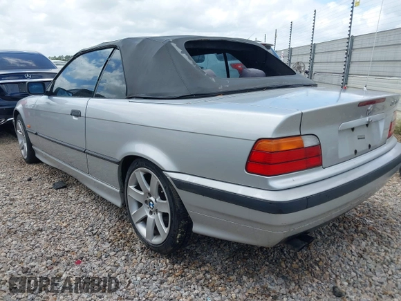 1998 BMW 3 Series 323icA with VIN WBABJ8334WEM22565, listed as a IAAI auction lot 41927799 with 165,077 mi miles. Bid and sale history available at carsss.com. Image 3.