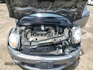 2007 MINI Hardtop S with VIN WMWMF73577TT84087, listed as a Copart auction lot 60208895 with 76,248 mi miles and Salvage title. Bid and sale history available at DreamBid. Image 11.