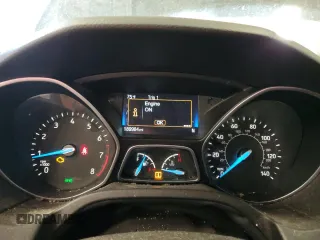 2015 Ford Focus SE z VIN 1FADP3F29FL255928, wystawiony jako Copart lot #72643654 z przebiegiem 189 984 mil mil oraz Szkoda całkowita • Salvage title. Historia ofert i sprzedaży dostępna na DreamBid. Obrazek 9.
